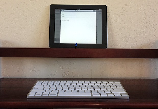 iPad with external Bluetooth keyboard used as a desk