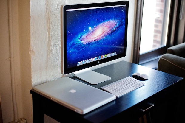 MacBook Pro docked to an Apple Cinema Display