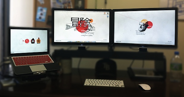 MacBook Pro desk setup of a digital media designer
