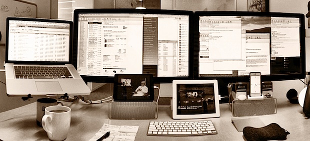 Mac desk setup of an IT Services Manager