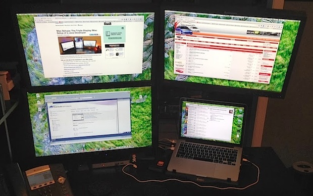 Four display panels with a MacBook Pro Retina
