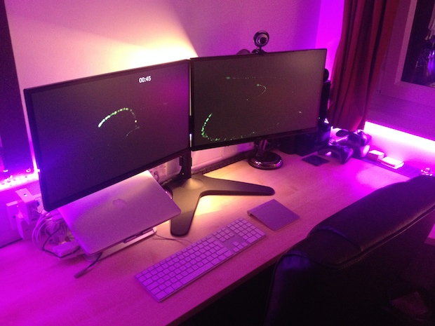 Dual monitor MacBook Pro setup with custom lighting