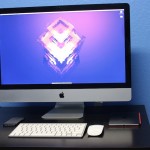 Student iMac desk setup with iPhone 5S and iPad Mini