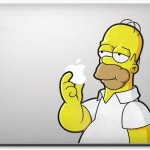 Homer eating the Apple logo decal on MacBook Air