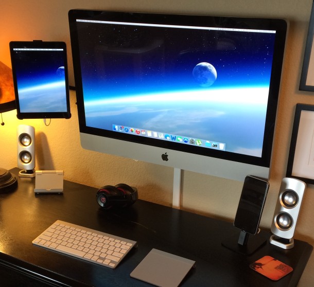 Wall mounted iMac with an iPad as secondary display