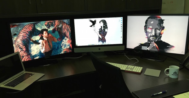 Mac setup: triple display workstation of a software development manager