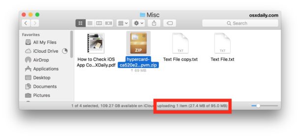 The status bar shows details of iCloud Drive uploads