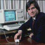 Steve Jobs with the Apple Lisa computer