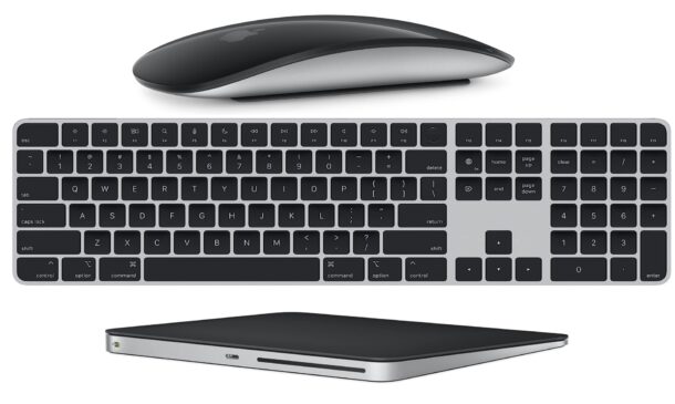 Black Mac accessories, including Apple Magic Keyboard, Magic Mouse, and Magic Trackpad