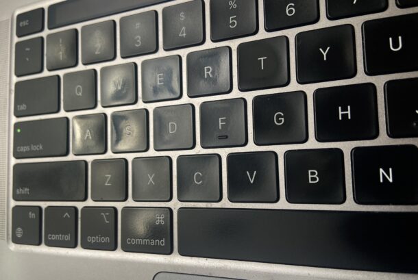 Shiny keys worn on M1 MacBook Pro